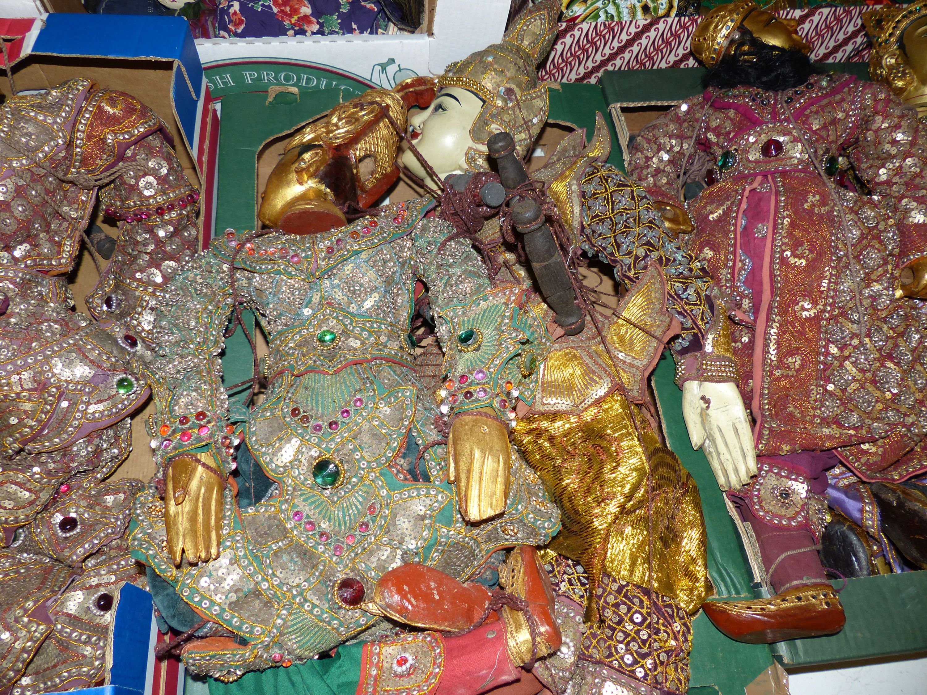 A quantity of Indonesian marionettes
